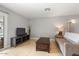 Living room with a TV and a couch at 1036 S 75Th St, Mesa, AZ 85208