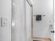 A clean bathroom with a tub, shower curtain, and towel rack at 10420 N 10Th St # 2, Phoenix, AZ 85020