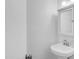 Clean half bathroom features a pedestal sink and neutral walls at 10420 N 10Th St # 2, Phoenix, AZ 85020