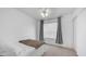 Neutral bedroom features a ceiling fan, plush carpet, and a sliding-door closet at 10420 N 10Th St # 2, Phoenix, AZ 85020