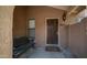 Inviting entryway featuring decorative stone, a bench, and a charming welcome mat at 10420 N 10Th St # 2, Phoenix, AZ 85020