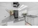 Bright, updated kitchen with granite countertops, stainless steel appliances and skylight at 10420 N 10Th St # 2, Phoenix, AZ 85020