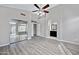 Large bedroom with wood floors, closet, access to the bathroom, and natural light at 115 W El Freda Rd, Tempe, AZ 85284