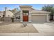 Charming single-story home with a well-manicured, desert landscape and a two car garage at 115 W El Freda Rd, Tempe, AZ 85284