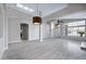 Bright and airy living room with wood floors, skylights and open to other areas of the house at 115 W El Freda Rd, Tempe, AZ 85284