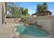 Refreshing pool with a baja step and mature landscaping in the backyard at 115 W El Freda Rd, Tempe, AZ 85284