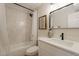 Cozy bathroom featuring stylish vanity and shower-tub combo with tile at 1301 N 44Th St, Phoenix, AZ 85008