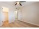 Clean bedroom with wood floors, showing closet and access to bathroom at 1301 N 44Th St, Phoenix, AZ 85008