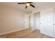 Bright bedroom with closet space, neutral walls, and wood-style flooring at 1301 N 44Th St, Phoenix, AZ 85008