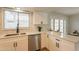 Updated kitchen with stainless steel appliances, white cabinets, and a modern faucet at 1301 N 44Th St, Phoenix, AZ 85008