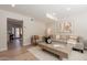 Cozy living room featuring wood floors, neutral decor, and open floorplan at 1301 N 44Th St, Phoenix, AZ 85008