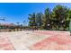Exterior shot of the basketball court showing the hoops and paved surface at 1351 N Pleasant Dr # 2051, Chandler, AZ 85225