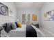 Comfortable bedroom with window and views of the outdoors at 1351 N Pleasant Dr # 2051, Chandler, AZ 85225