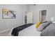 Bright bedroom showcasing an open doorway to kitchen and bathroom at 1351 N Pleasant Dr # 2051, Chandler, AZ 85225