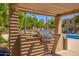 Poolside community BBQ area, ideal for gatherings and enjoying outdoor cooking near pool at 1351 N Pleasant Dr # 2051, Chandler, AZ 85225