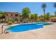 Gorgeous community pool, perfect for relaxation with inviting water and comfortable lounging at 1351 N Pleasant Dr # 2051, Chandler, AZ 85225