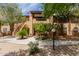 Charming stucco condo with beautiful landscaping and a private balcony in a vibrant community at 1351 N Pleasant Dr # 2051, Chandler, AZ 85225