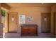 Exterior shot of community pool entrance with doors labeled and cautions about shallow water at 1351 N Pleasant Dr # 2051, Chandler, AZ 85225