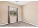 Bedroom with neutral carpet and curtains that create a soothing ambiance at 1367 S Country Club Dr # 1327, Mesa, AZ 85210