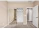 Bedroom featuring carpet and closet with sliding door at 1367 S Country Club Dr # 1327, Mesa, AZ 85210