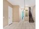 Open hallway features a staircase, bathroom and a pendant light fixture at 1367 S Country Club Dr # 1327, Mesa, AZ 85210
