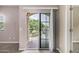 Patio with metal safety railing and view of neighborhood through sliding door at 1367 S Country Club Dr # 1327, Mesa, AZ 85210