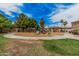 A playground with slides and other equipment is set in a landscaped park with a covered picnic area at 1367 S Country Club Dr # 1327, Mesa, AZ 85210