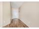 Inviting entryway featuring wood-look tile flooring and a white front door at 14352 W Lamoille Dr, Surprise, AZ 85374
