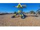 Outdoor playground with colorful slides and shaded structures for recreation at 14352 W Lamoille Dr, Surprise, AZ 85374