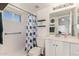 Bathroom with shower, toilet, and vanity with mirror at 14390 W Morning Star Trl, Surprise, AZ 85374