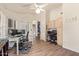 Bright office with wooden floors, lots of natural light and ample workspace at 14390 W Morning Star Trl, Surprise, AZ 85374
