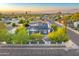Attractive aerial view showcases a home with solar panels and a beautifully landscaped yard at 1444 E Coronado Rd, Phoenix, AZ 85006