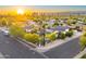 Stunning aerial view of a vibrant neighborhood with the city skyline at sunset at 1444 E Coronado Rd, Phoenix, AZ 85006