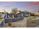 Relaxing back yard featuring privacy fence, desert landscaping, and brick patio at 1444 E Coronado Rd, Phoenix, AZ 85006
