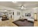 Open-concept living and dining area with hardwood floors and a cozy sofa at 1444 E Coronado Rd, Phoenix, AZ 85006