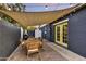 Outdoor patio featuring a rustic wooden table, perfect for outdoor dining and enjoying the backyard at 1444 E Coronado Rd, Phoenix, AZ 85006