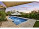 Inviting pool area with patio furniture and lush landscaping for outdoor enjoyment at 1444 E Coronado Rd, Phoenix, AZ 85006