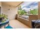This spacious balcony has comfortable seating and views of the beautiful community at 14950 W Mountain View Blvd # 7209, Surprise, AZ 85374