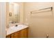 The bathroom features a well-lit vanity, a large mirror, and plenty of space at 14950 W Mountain View Blvd # 7209, Surprise, AZ 85374