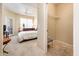 Bright bedroom with large window, carpet flooring, closet, and ceiling fan at 14950 W Mountain View Blvd # 7209, Surprise, AZ 85374