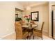 Charming dining area featuring a glass table and stylish seating, ideal for intimate meals at 14950 W Mountain View Blvd # 7209, Surprise, AZ 85374