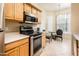 Well-equipped kitchen with stainless steel appliances and a cozy breakfast area at 14950 W Mountain View Blvd # 7209, Surprise, AZ 85374