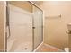 Tiled stand up shower with sliding glass door at 14950 W Mountain View Blvd # 7209, Surprise, AZ 85374