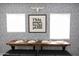 Eclectic dining area with a unique wallpaper, a modern table setting, and stylish decor at 1513 E Sheridan St, Phoenix, AZ 85006