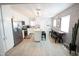 Bright, open kitchen with white cabinets, stainless steel appliances, and a large center island at 1513 E Sheridan St, Phoenix, AZ 85006
