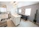 Open-concept kitchen with a center island, modern appliances, and adjacent dining area at 1513 E Sheridan St, Phoenix, AZ 85006