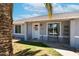 Charming front porch with inviting decorations, a bench, and desert landscaping at 1531 S Padre Rd, Apache Junction, AZ 85119