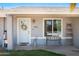 Inviting front porch with a decorative door, and a warm decor at 1531 S Padre Rd, Apache Junction, AZ 85119