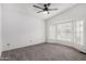Cozy bedroom with neutral carpet, large window and spacious closet at 1784 E Torrey Pines Ln, Chandler, AZ 85249