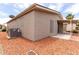 Angle shot of home's exterior and covered patio at 1784 E Torrey Pines Ln, Chandler, AZ 85249